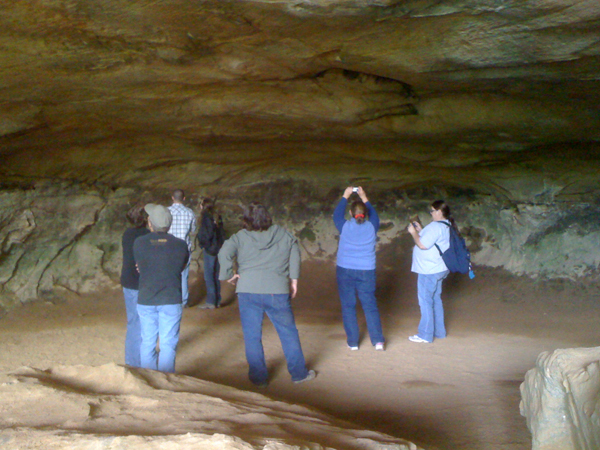 Viewing rock art at Rock House Cave